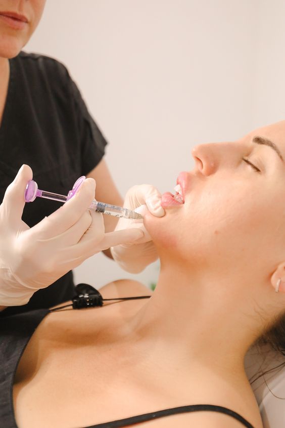 Chin filler injection process at Luna Academy